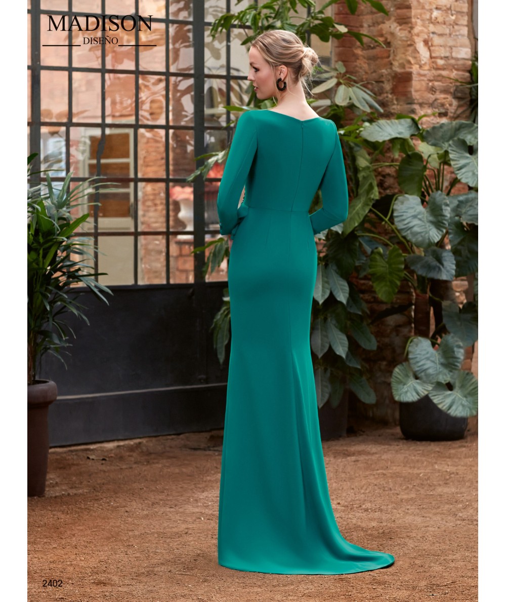 Elegant long plain dress with appliqués on the neckline and long sleeves